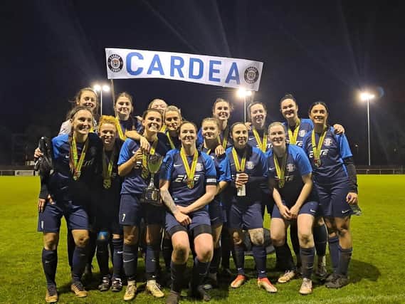 Cardea Ladies celebrate their Hunts County Cup Final success.