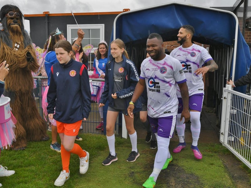 Aaron McLean walks out of the tunnel.
