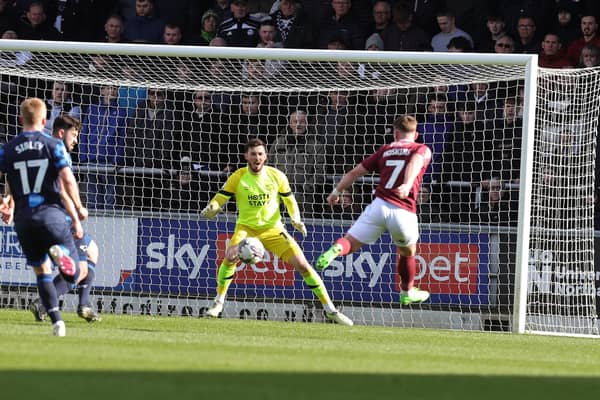 Sam Hoskins scores for Northampton Town against Derby County. Photo by Pete Norton/Getty Images.