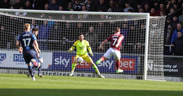 Sam Hoskins scores for Northampton Town against Derby County. Photo by Pete Norton/Getty Images.