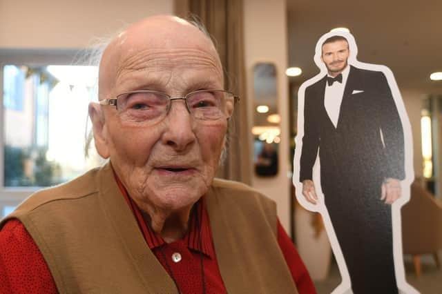 102-year-old David Beckham superfan Mona Hurry with her life-size cardboard cut-out of Becks at Castor Lodge Care Home, in Peterborough