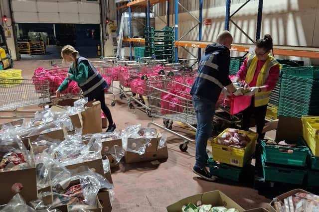 Staff at Yours Clothing pack the hampers inside the retailer's Peterborough warehouse