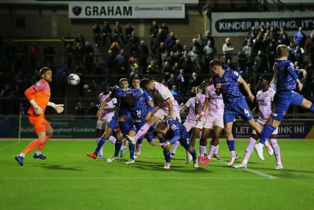 Ronnie Edwards scores for Posh against Carlisle. Photo Joe Dent/theposh.com