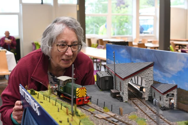 Market Deeping Model Railway Club member Jenni Ashwood with the model of Euston Station.