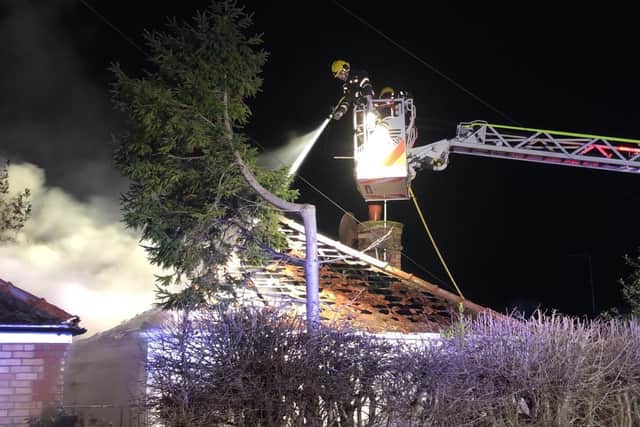 Crews attending the fire on Hundred Road in March. Photo: Cambs Fire and Rescue.