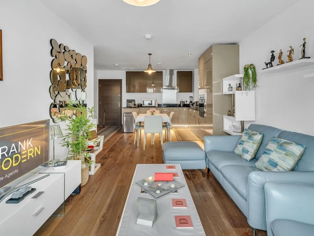 Another view of the lounge and kitchen areas