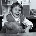 1983 - Hannah Hayward (nee Wilson) is pictured clutching a teddy bear at Queen’s Drive Infant School