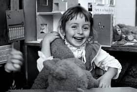1983 - Hannah Hayward (nee Wilson) is pictured clutching a teddy bear at Queen’s Drive Infant School