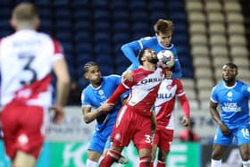 Peterborough United's automatic promotion hopes suffered a big blow at Oxford United.