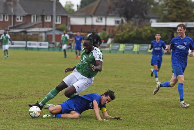 David Yisah (green) in action for FC Peterborough against Aylestone Park.