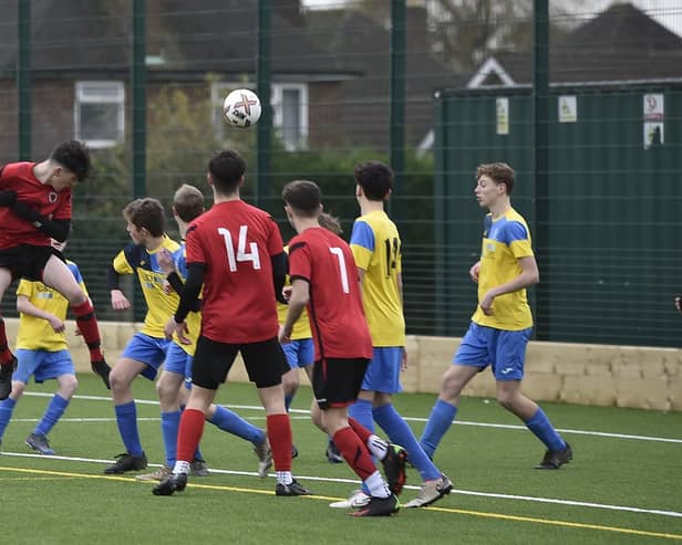 Netherton U15s (red) on the attack in a League Cup game against Ketton. Photo: David Lowndes.