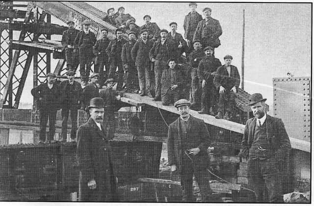 Workers on the construction of Crescent Bridge