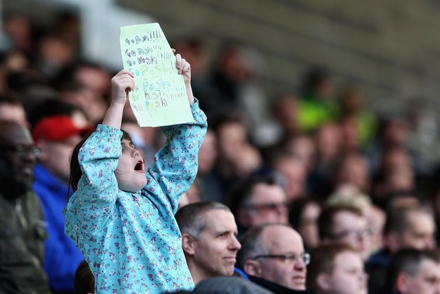 A young Peterborough United fan shows her support to her team against Coventry City on March 28, 2015.