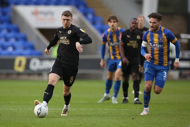 Jack Taylor (left) in action for Posh at Shrewsbury last month. Photo: Joe Dent/theposh.com.