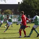Vitor Vaz scores for FC Peterborough against Biggleswade United.