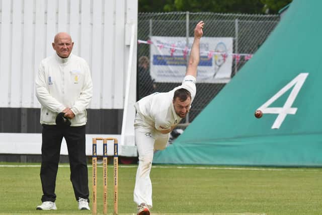 Jamie Smith bowling for Peterborough Town against Desborough at Bretton Gate last weekend. Photo: David Lowndes.