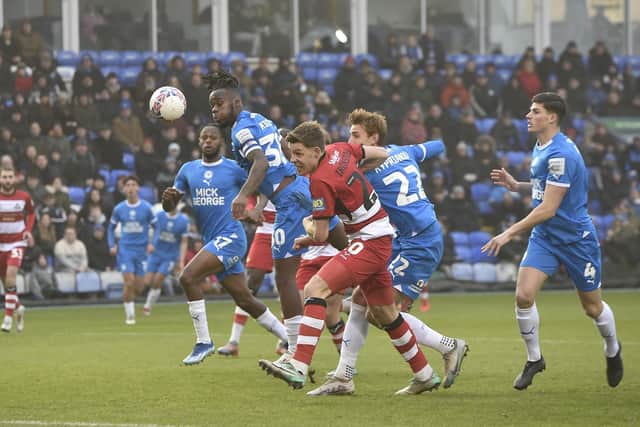 Harrison Burrows' cross flies into the Doncaster net. Photo: David Lowndes.