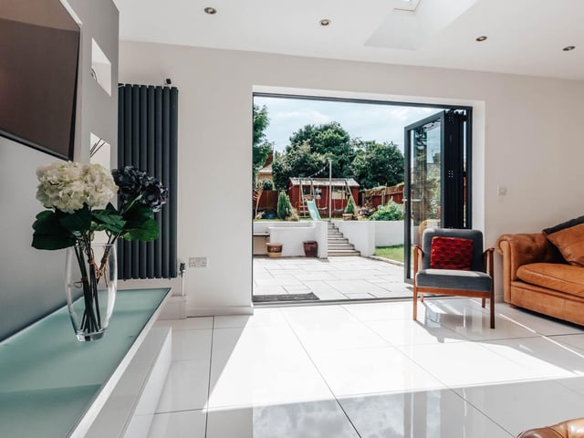 Bifolding doors open onto the rear garden