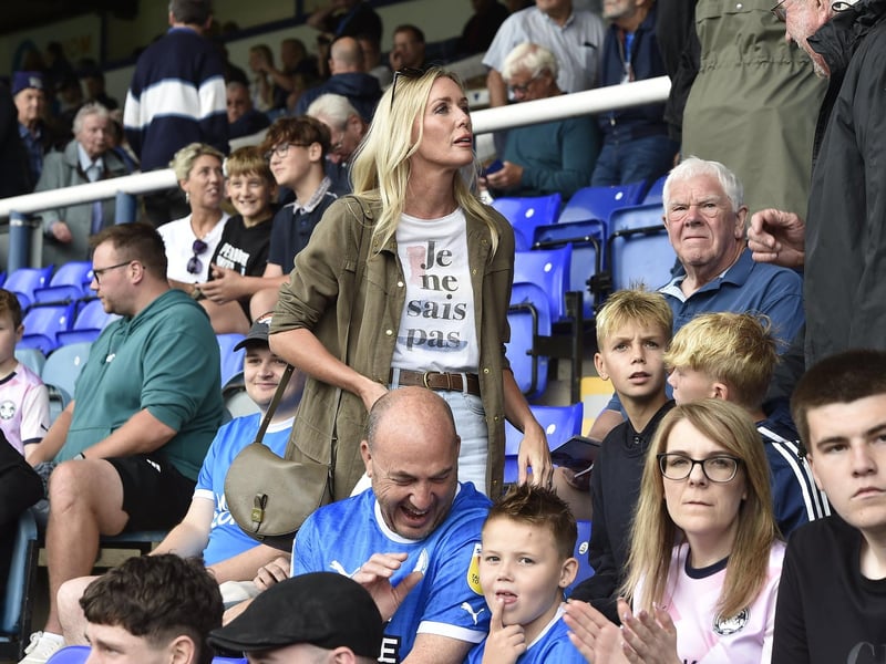 Peterborough United fans watch their side's defeat to Derby County.