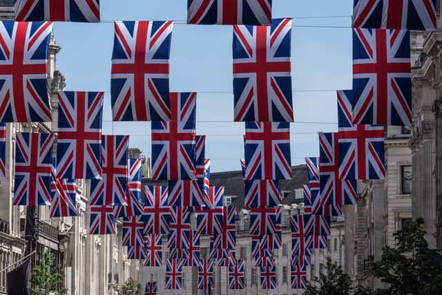 Union Jacks on Regent Street in London. (Photo by Carl Court/Getty Images)