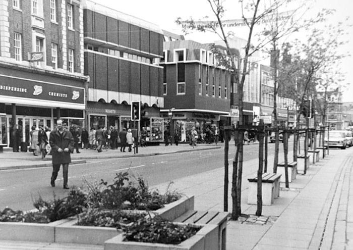 A pre-pedestrianised Bridge Street, showing shoppers making full use of one of the very many Boots stores that have adorned the city over the past hundred years.