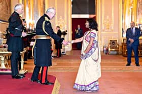 Miss Jyoti Shah MBE attending the recent investiture at Buckingham Palace with King Charles.