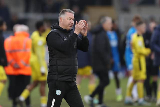 Peterborough United Manager Darren Ferguson acknowledges the travelling fans at full-time. Photo: Joe Dent.