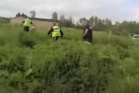 An image from the video footage of the chase through the field