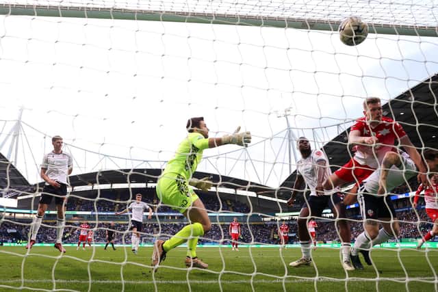 Sam Cosgrove opens the scoring for Barnsley at Bolton. Photo by Michael Steele/Getty Images.