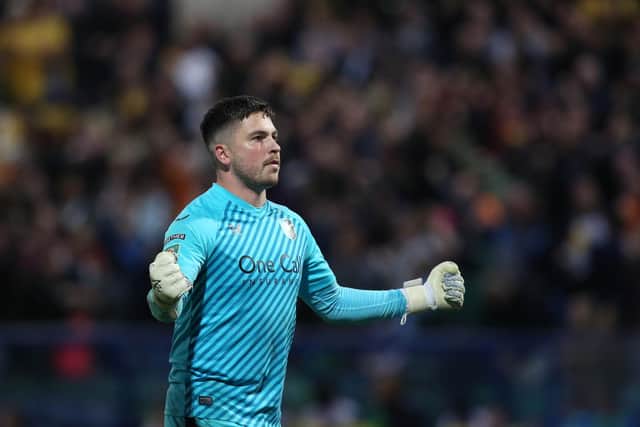 Christy Pym celebrates after Mansfield beat Posh in a Carabao Cup tie last season. Photo Joe Dent/theposh.com.