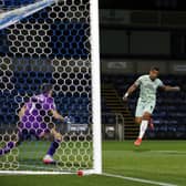 Jonson Clarke-Harris of Peterborough United scores the equalising goal against Wycombe Wanderers. Photo: Joe Dent.