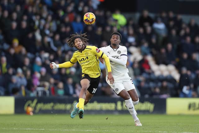 Emmanuel Fernandez battles for the ball against Burton. Photo: Joe Dent/theposh.com