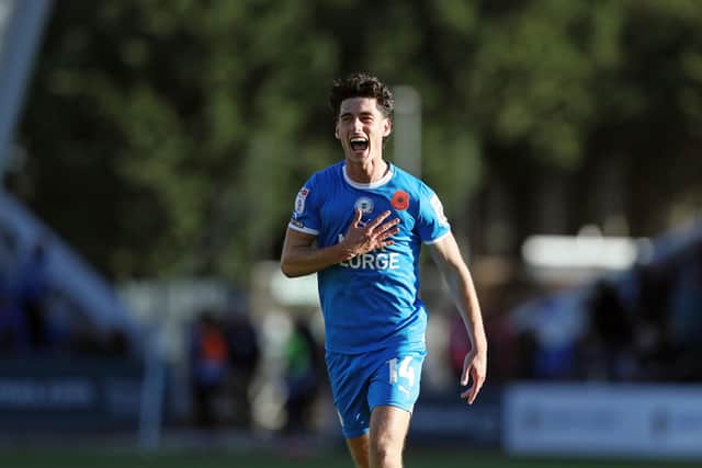 Joel Randall celebrates the fifth goal going in. Photo: Joe Dent.
