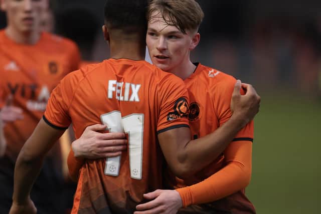 Bayley McCann congratulates Kaine Felix on his goal for Sports against Spennymoor. Photo Darren Wiles