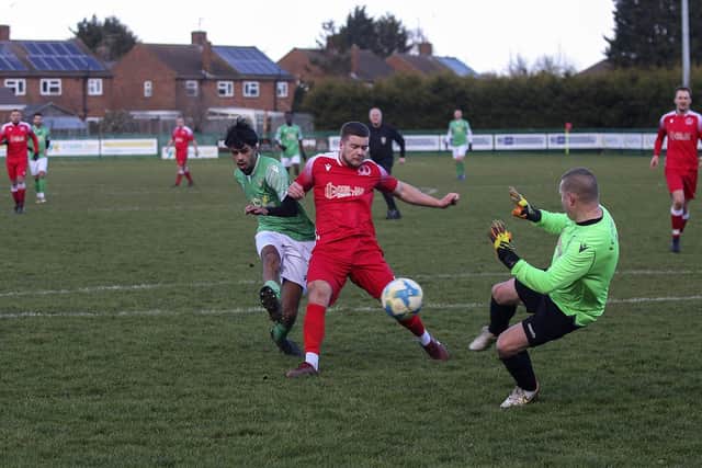 A goal for FC Peterborough (green) in their 3-0 Peterborough League Cup win over Polonia. Photo: Tim Symonds.