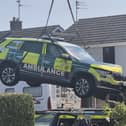 The ambulance rapid response vehicle is taken away from the scene of a traffic collision in Whittlesey