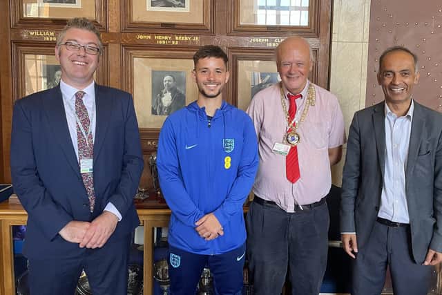 Will is welcomed to the Town Hall to celebrate his selection and to meet Mayor Nick Sandford (middle) as well as councillors local ward John Howard and Mohammed Farooq.