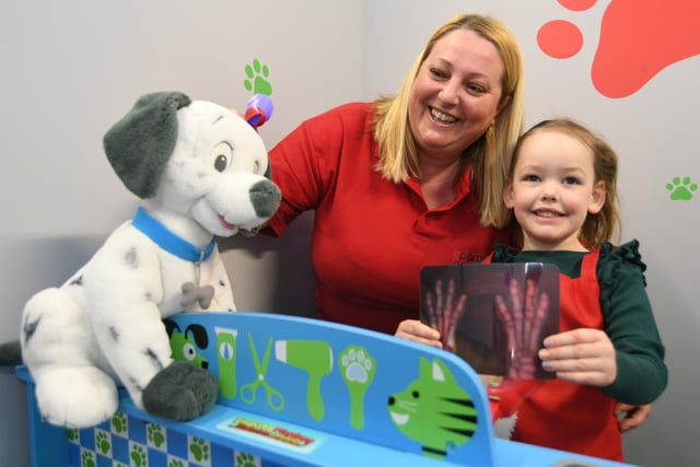  Opening of the Inspired Playtown at Hampton. Pamela Gane and Alexandra Jeffery (4) in the Pampered Pooch play area