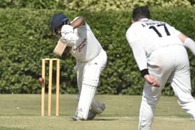 Kasahaf Hussain of Barnack is bowled by Ayub Khattak of Falcon. Photo: David Lowndes.