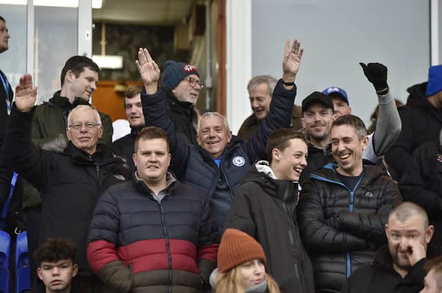 Peterborough United fans watch on as defeat to Wycombe spells the end for Grant McCann.