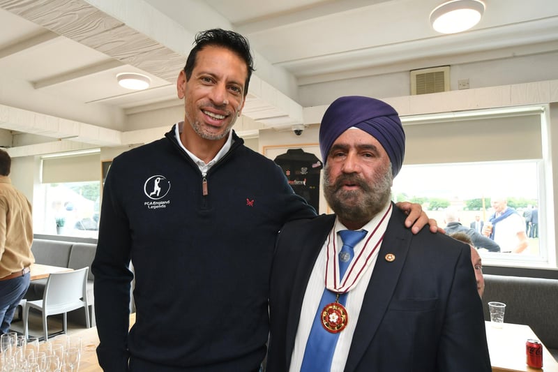 Englands Cricket Legend Saj Mahmood (left) with fan Jaspal Singh.