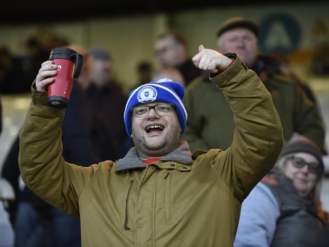 A fan enjoys the pre-match build-up