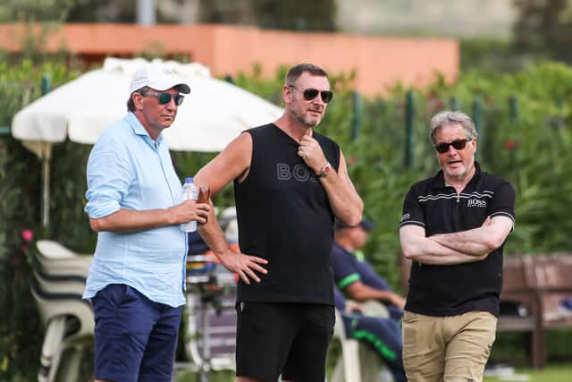 Posh co-owners, from left, Dr Jason Neale, Darragh MacAnthony and Stewart Thompson during the club's pre-season training camp in Portugal. Photo Joe Dent/theposh.com.