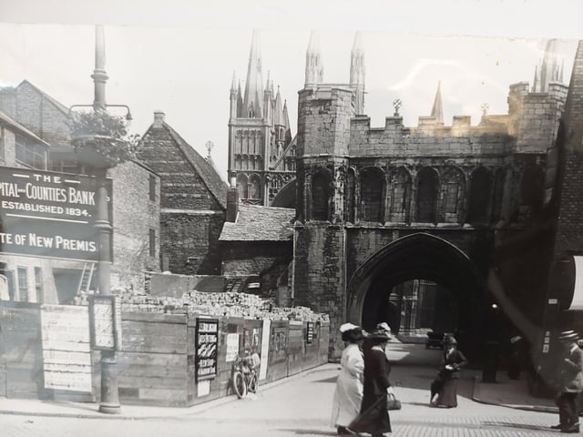 From 1913 - a view of Peterborough Cathedral through and over the Norman Arch.