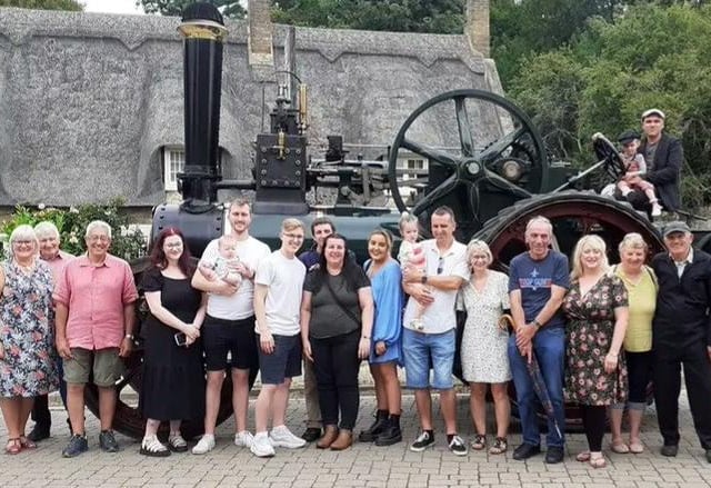 From left to right: Ann Huckle, Gerry Williamson, Peter Huckle, Rosie, Luke Gibbons, baby Holden Gibbons, Josh Gibbons, James Fretwell, Alison Fretwell (nee Gibbons), Lucy Fretwell,, Halle Rose Gibbons, Darren Gibbons, Louise Gibbons, Peter Gibbons, Sarah Watkins, Julia Fitzjohn, David Gibbons, Martin Gibbons (top), Marion Mabel Gibbons.