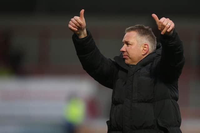 Peterborough United Manager Darren Ferguson gives the thumbs up at full-time at Morecambe. Photo: Joe Dent/theposh.com