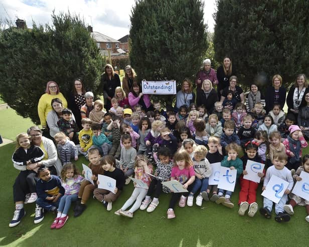 Staff and children at Caverstede Nursery School in Walton.