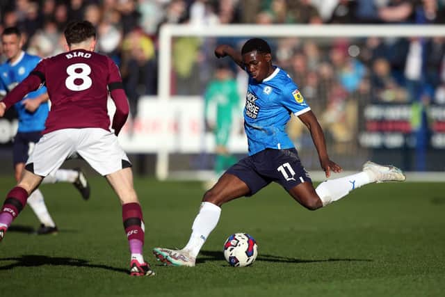 Kwame Poku of Peterborough United in action against Derby County. Photo: Joe Dent/theposh.com