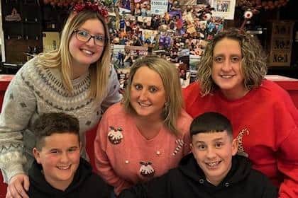 Holli (centre) with her sister Jayde Allen and Kayley Moses and two nephews Charlie and Alfie
