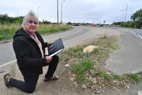 Mark Fishpool checking out the state of the A47 at junction with Welland Road.